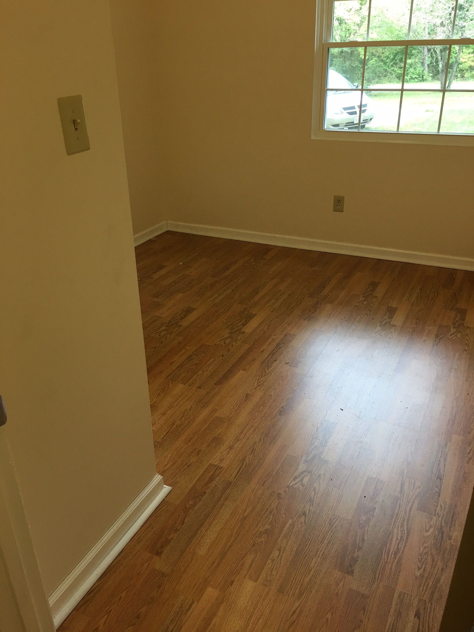 This is Bedroom #1. The window lets in a ton of light and there is a large closet with plenty of storage. - 2680 Ballsville Road