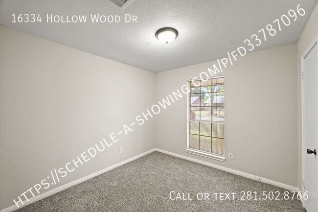 Building Photo - 16334 Hollow Wood Dr