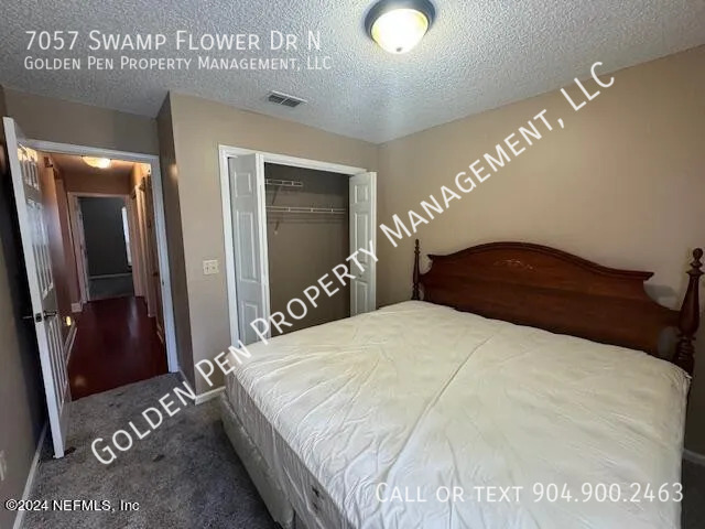 Building Photo - 7057 Swamp Flower Dr N