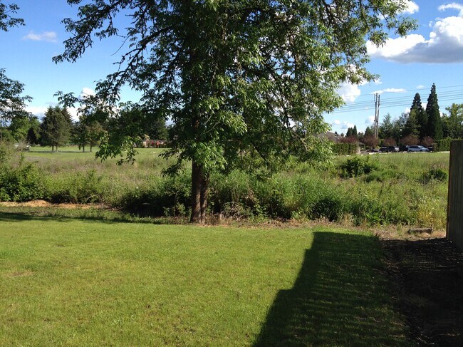 Backyard view, bike path and golf course - 19670 NW Pondosa Ct