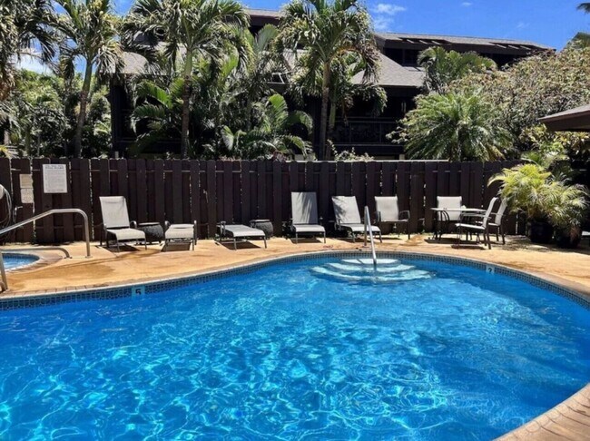 Building Photo - Spacious 2BR/2BA Condo with Garden View – Steps from the Ocean