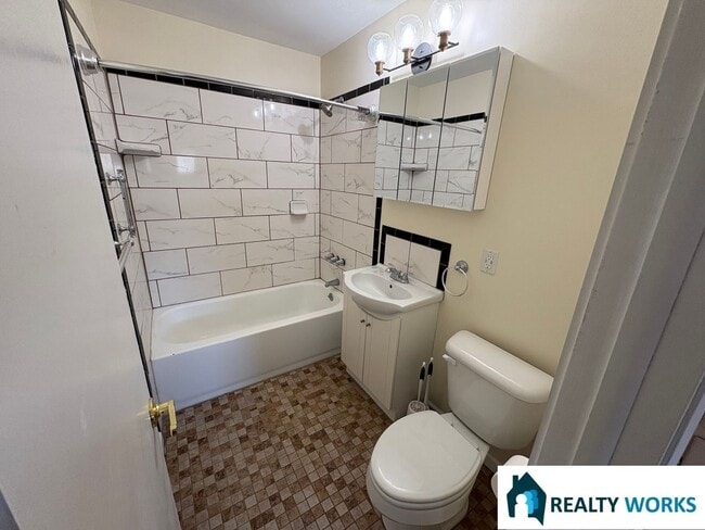 Building Photo - 2-Bedroom Home with Hardwood Floors