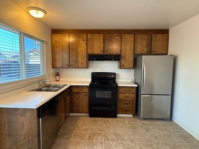 Building Photo - For Rent – Charming 2-Bedroom Home in Rinc...