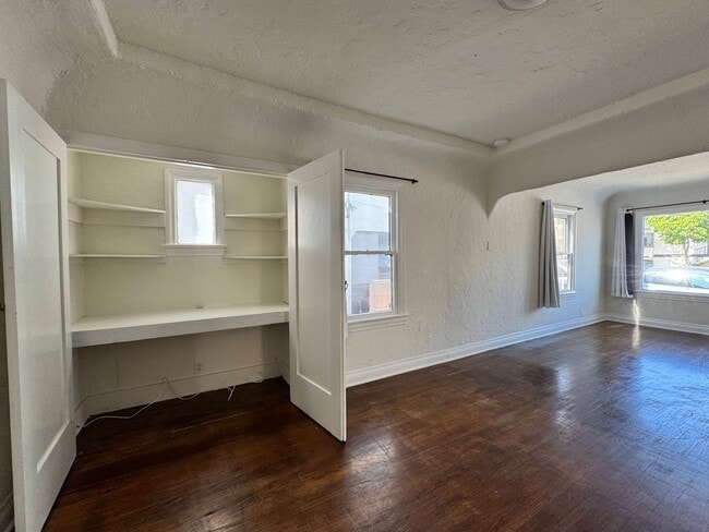 Building Photo - Two Bedroom Front House near Westside Village