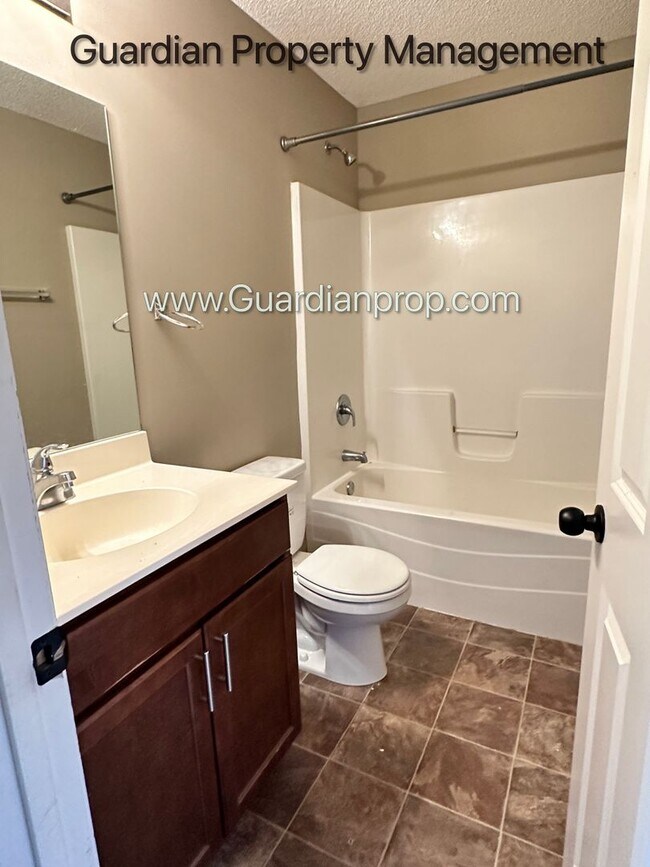 Building Photo - Champlin Corner Unit Town Home, 2 Car Garage, Dishwasher, Washer/Dryer, Balcony