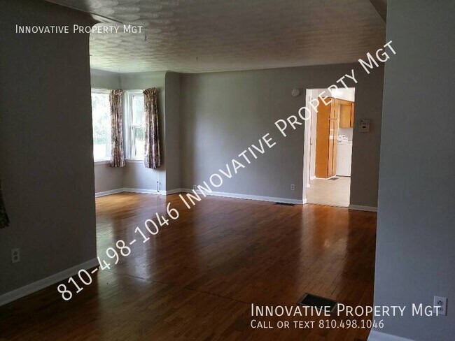 Building Photo - Spacious 4 bedroom , 1 1/2 bath home in Ga...