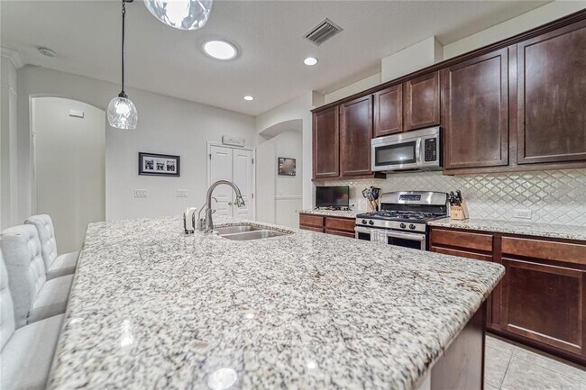 Building Photo - 6906 Covington Stone Ave