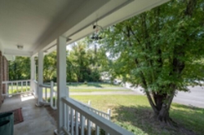 Building Photo - This beautifully updated brick home in Har...