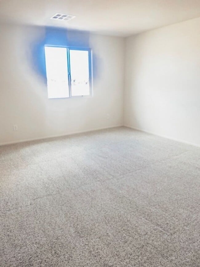 Building Photo - Beautiful Townhome in a Gated Community with 2-Car Garage!!