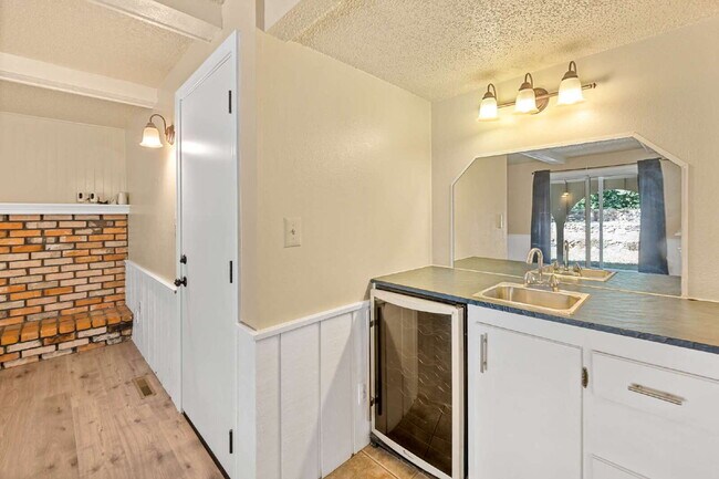 Building Photo - 3-Bedroom with A Flex Room Multi-Level Home with Fresh Paint, Refreshed Deck, and Multiple Living...