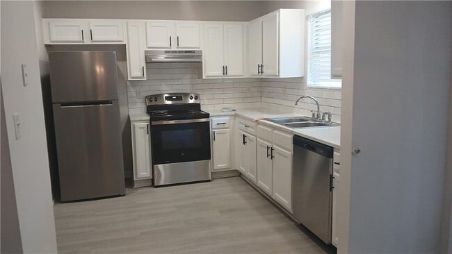 Building Photo - 5677 Wind Gate Ln