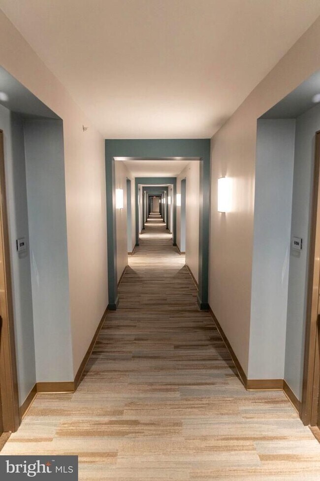 Building Photo - Bright 1BR with Parking Included, Minutes from The Wharf!