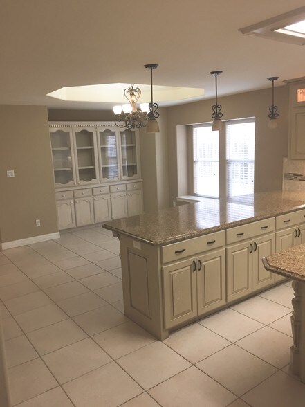 Big breakfast bar, plenty of storage!! - 10212 N 12th St