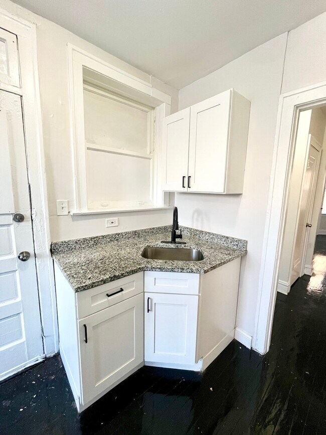 Building Photo - 4126 W 24th Pl