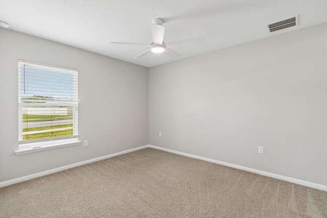 Building Photo - Modern 4BR Home with 3 Full Baths in River Glen | Screened Porch & Resort-Style Amenities