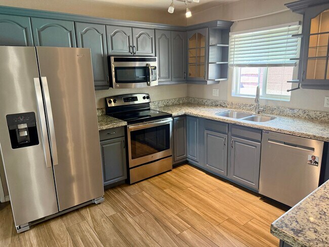 Building Photo - 4 bedroom home with private pool & solar