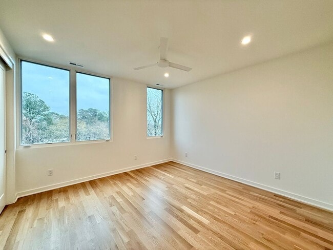 Building Photo - Luxurious New Construction 4BD, 2.5BA Raleigh Townhome with a Rooftop Terrace in a Prime Location...