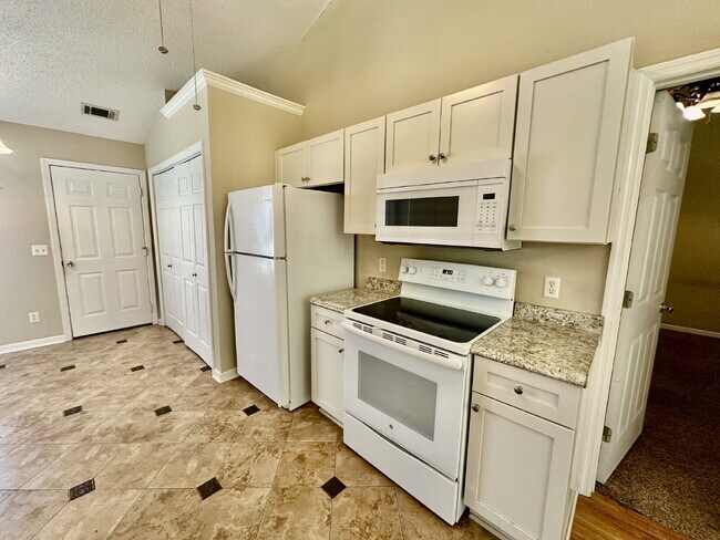 Building Photo - Rivers End Three Bedroom Home with a Fence...