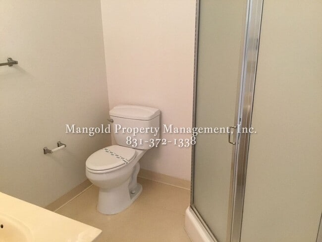 Building Photo - Spacious 2-Bed, 2-Bath Condo with Fireplac...