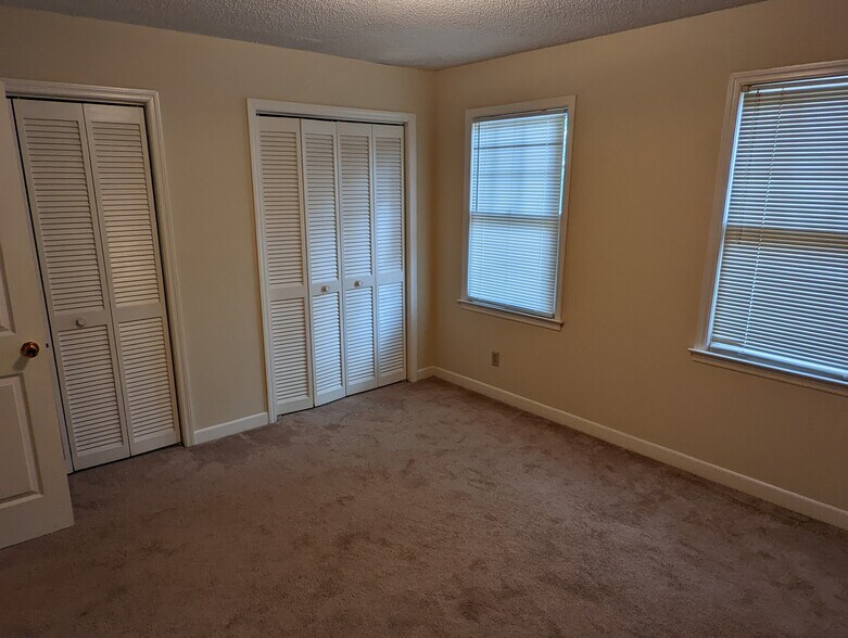 BR 2 double closets - 215 Woodburn Club Ln
