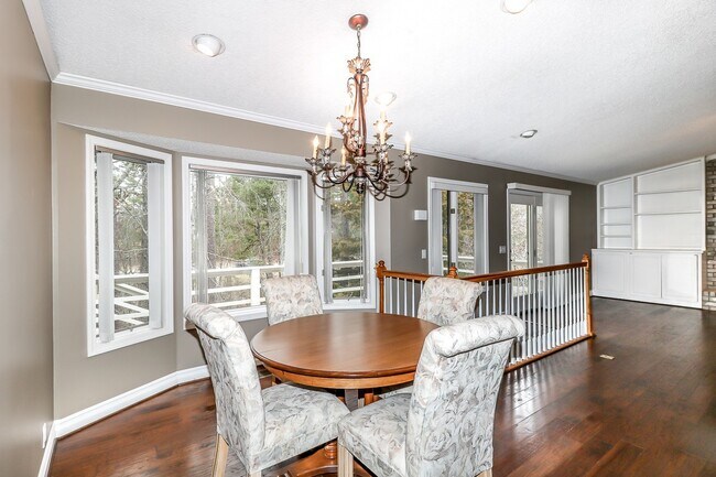 Building Photo - Beautiful 4 Bedroom, 3 Bath home. It has a 2 car garage plus a 1 car carport.  Stay warm in the w...