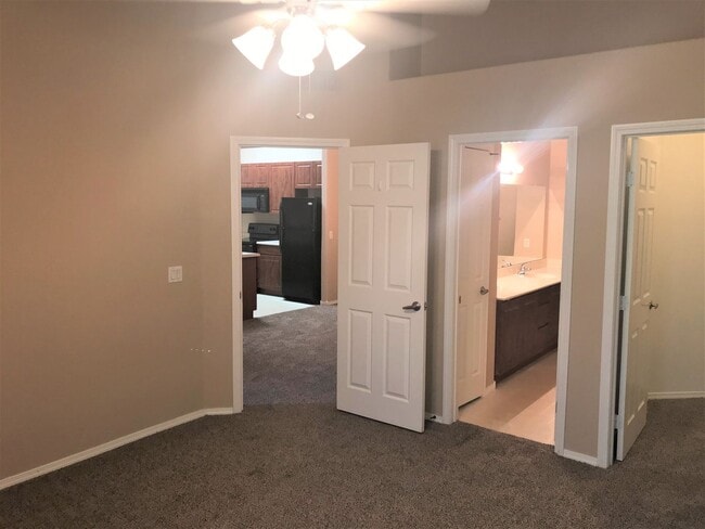 Building Photo - **SPECTACULAR - 2BEDROOM/2BATHROOM/1GARAGE/GATED CONDO (SOUTHERN & CRISMON)**