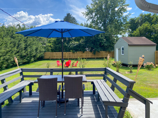 fun sized back porch overlooking large grassed in backyard - 10 Newark St