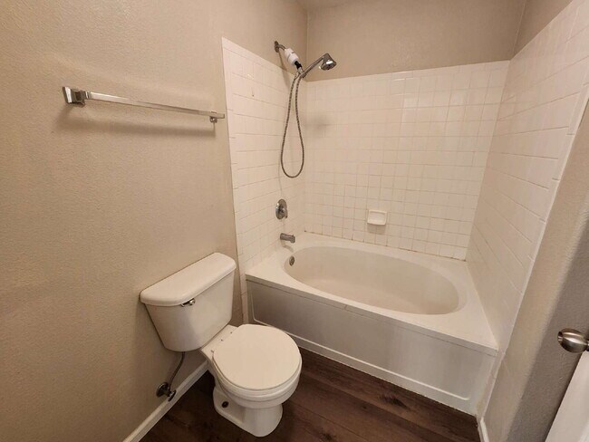 Building Photo - Spacious Two-Suite Townhome With Garage, Fireplace And Community Pool