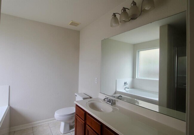 Building Photo - 9414 Coatsworth Dr