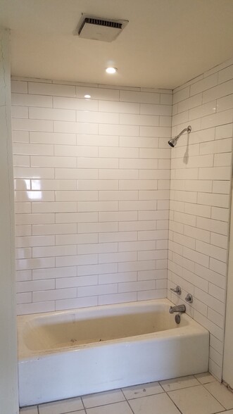 Updated shower. - 201 E Alice Ave