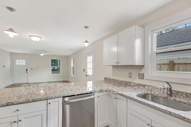 Building Photo - 6961 Raymond Ave