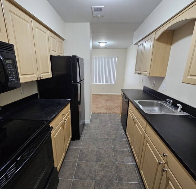 Building Photo - 1 Bedroom Condo Close to Lake St. Clair. Upper Unit with Spacious Living Room, Large Bedroom and ...