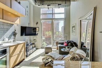 Building Photo - Two-Level Loft Condo at The Metropole