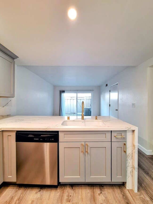 Building Photo - Spacious Two-Story 3bd Townhouse With Private Patios, Balcony, & Garage