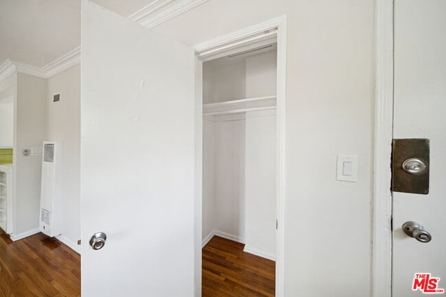 Building Photo - 7571 Willoughby Ave