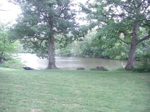 Building Photo - Beautiful Duplex Located in Serene, Wooded...