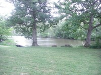 Building Photo - Beautiful Duplex Located in Serene, Wooded...