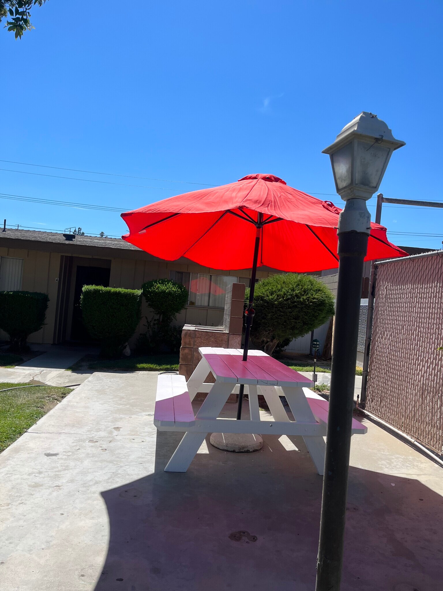 BBQ Picnic area with view to Apt A entrance - 4607 Plaza Ln