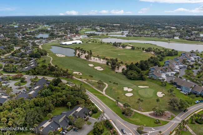 Building Photo - 9787 Sawgrass Dr E