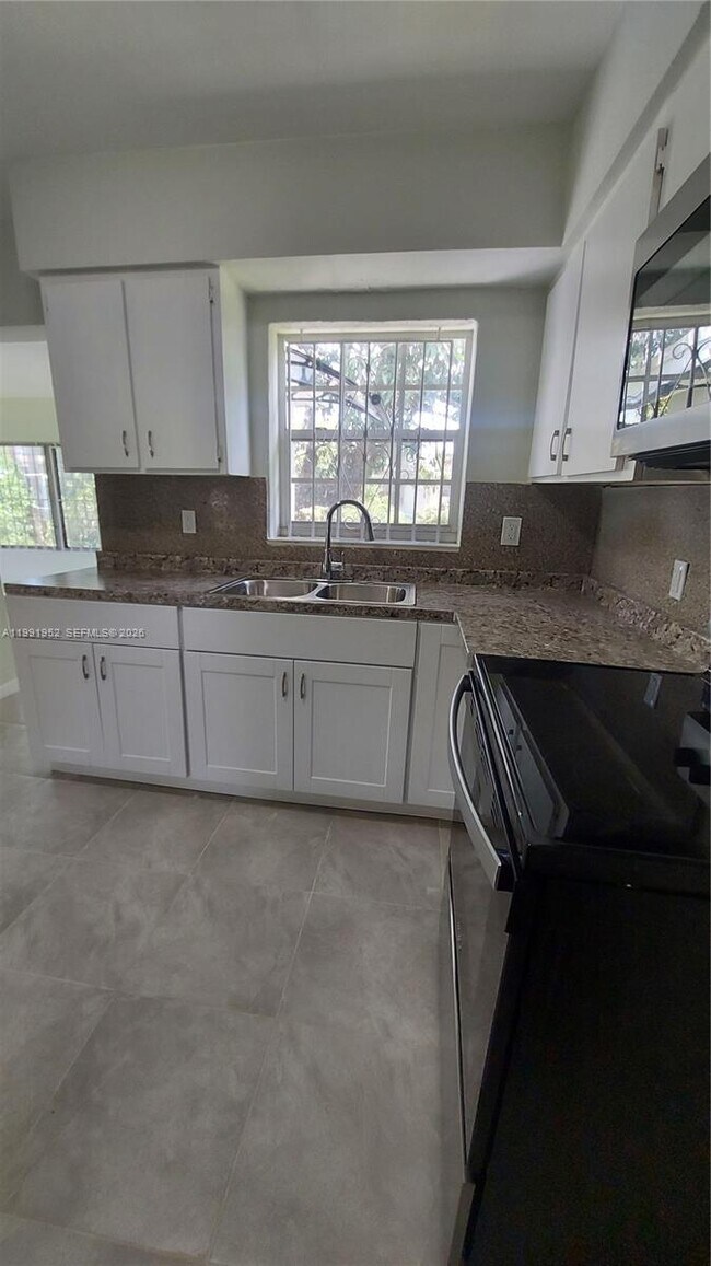 Building Photo - 8915 NW 10th Ave