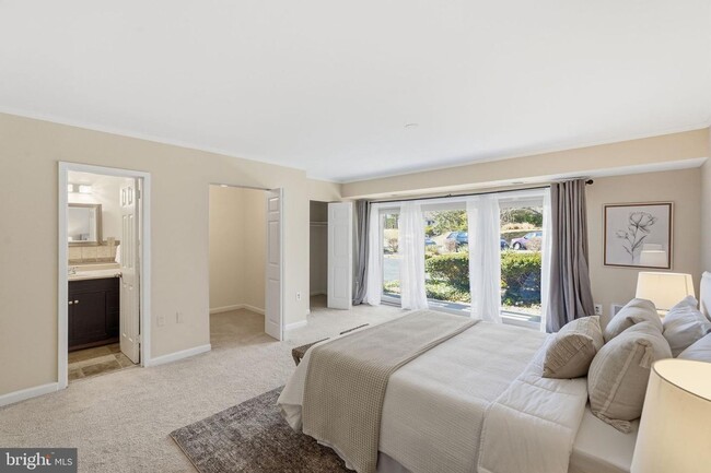 Building Photo - Welcome to this rarely available and beautifully updated ground-level condo offering the perfect ...