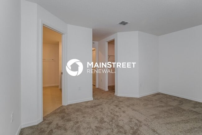 Building Photo - 4 Bedroom Pet-Friendly Home in Mascotte, FL with Main Street Renewal