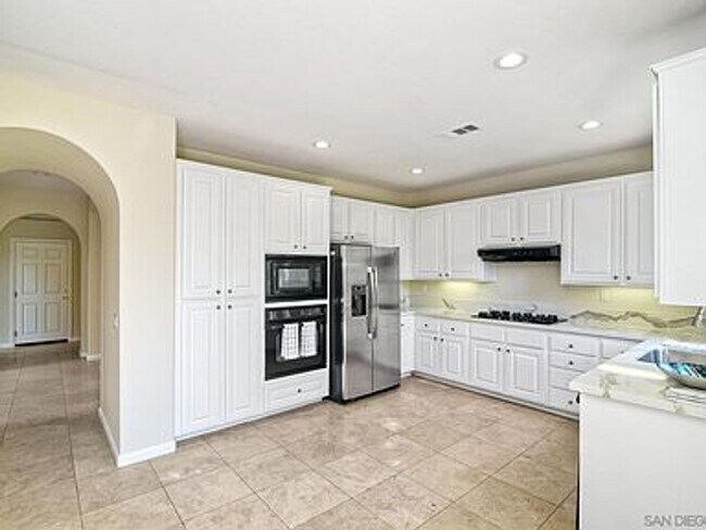 Building Photo - Stylish Torrey Santa Fe Living – 4 Bed, 2.5 Bath Gem