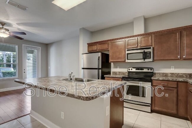 Building Photo - 4220 Plantation Oaks Blvd