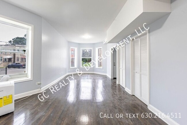 Building Photo - 6433 S Vernon Ave