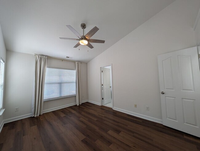 Building Photo - Pristine End Unit Townhome located in the Prosperity Place community!