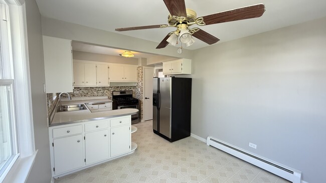 Building Photo - 3658 N Laramie Ave