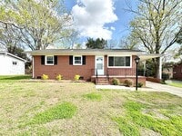 Building Photo - Charming 2BR with Refinished Hardwoods