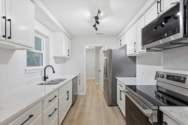 Building Photo - 5719 Enchanted Ln