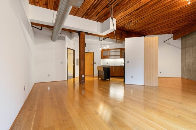 Building Photo - Chic, urban studio condo in the Pearl—Peaceful, In-unit w/d, 14-ft ceilings, deeded parking